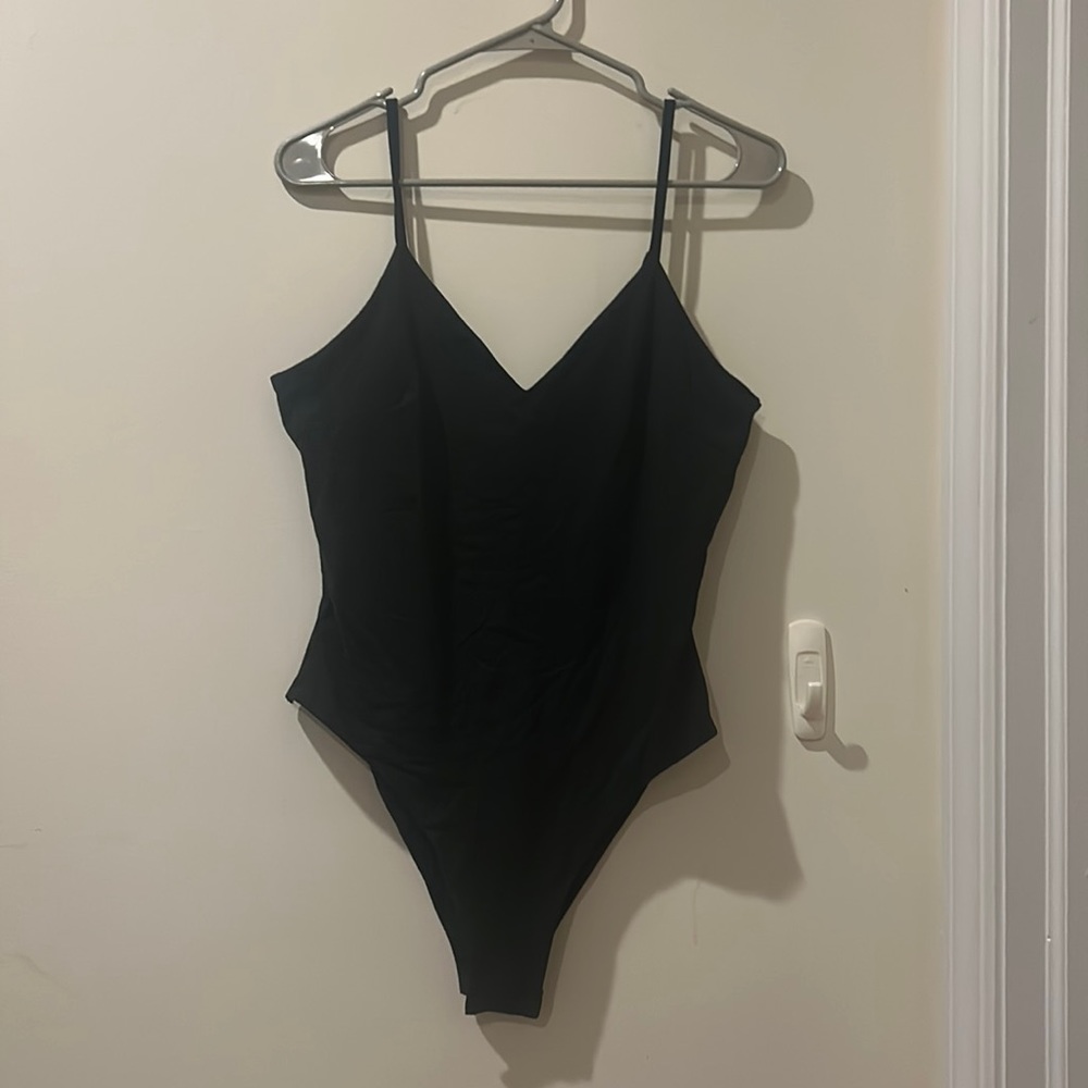 Black body suit with adjustable straps